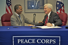 Peace Corps Director Aaron S. Williams (Dominican Republic, 1967-1970) and President and CEO of CHF International Michael E. Doyle (Colombia, 1962-1964).