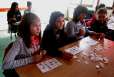 Macedonian students participate in Halloween bingo.