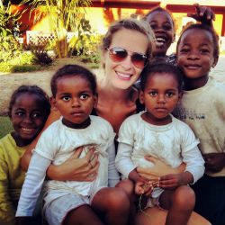 Peace Corps volunteer Raegan Spencer with children in Madagascar.
