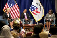 (From left to right) Virginia Emmons McNaught, founder of Educate Tomorrow and former Peace Corps volunteer in Niger, Frederick Swaniker, founder and CEO of the African Leadership Academy, and Sandra E. Taylor, president and CEO of Sustainable Business International and former Starbucks senior vice president of corporate social responsibility, speak on a panel at the event.