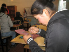 Workshop participant working on a project