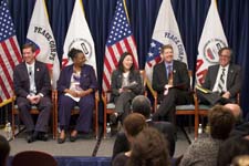Malaria prevention leaders speak at a World Malaria Day discussion at Peace Corps headquarters.