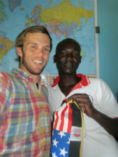 Peace Corps volunteer Matthew Boddie with his Ugandan counterpart.
