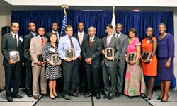 Left to right: Jonathan Santiago, Leslie Jean-Pierre, Rollin Johnson, Jr., Rosette Nguyen, Seth Pickens, Joshuah Marshall, Fred Ochieng', Earl Yates, Richard Lopez, Milton Ochieng', Sia Barbara Ferguson Kamara, Mrs. Rodney Davis-Gilbert, Shari Hubert