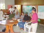 Photo of participants speaking at an environmental panel on water issues.