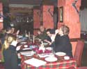 Photo of volunteers eating at a table