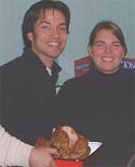 Photo of volunteers holding a turkey