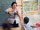Lorien teaches an English class using interactive games highly enjoyed by the students participating.
