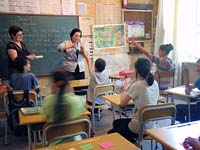 Lorien teaches an English class using interactive games highly enjoyed by the students participating.