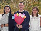 PCRV Brian Woods posses with HERA doctors and staff at his going away party.