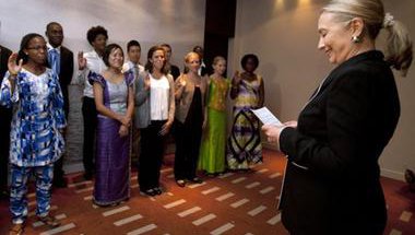 Secretary of State Hilary Clinton swears in group of Peace Corps Volunteers