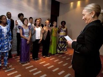 Secretary of State Hilary Clinton swears in group of Peace Corps Volunteers