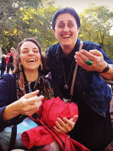 Julia and her counterpart laughing