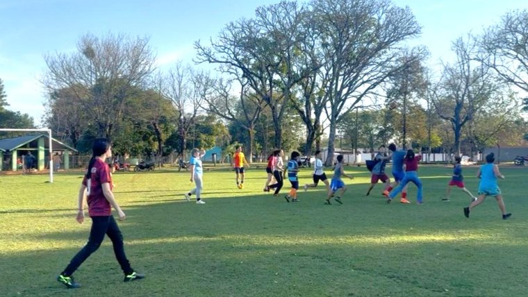 Students play soccer in Paraguay.