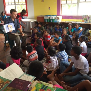 Group reading at the library during Saturday Storytime. We’ve crafted short story books after reading hour in the past.