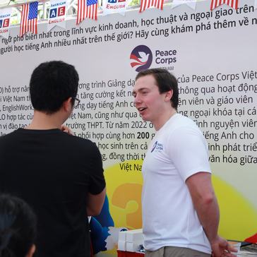 Sean speaks to locals about English language learning at the 30th Anniversary Friendship Festival between the U.S. and Viet Nam.
