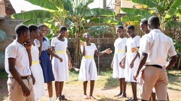 Group of children clapping and laughing