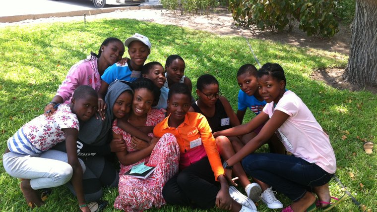 Group of youth leaders gathered for a photo after youth leadership training.