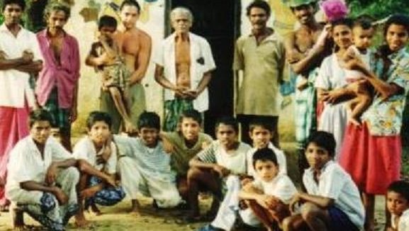 Peace Corps Volunteer with Villagers