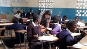 Volunteer Emily Hirsch teaching math in Zambia