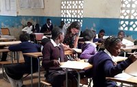 Volunteer Emily Hirsch teaching math in Zambia