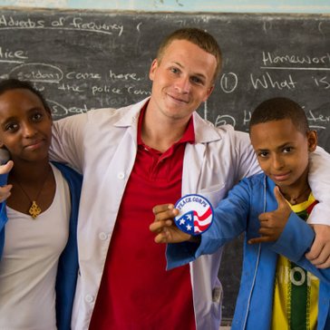 Teacher with students in Ethiopia