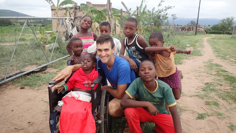 Nate with local youth in Eswatini.