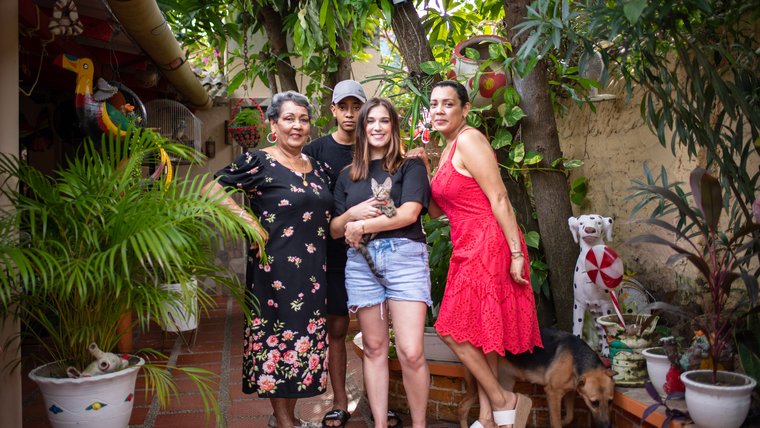 Peace Corps Volunteer Kaela with her host family in Colombia.