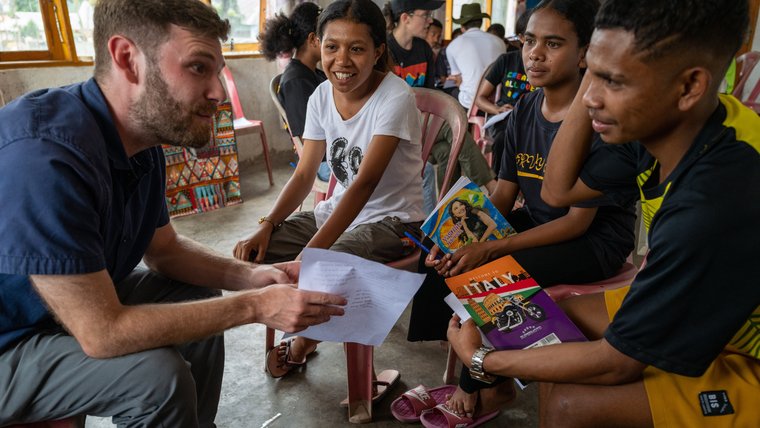 PCV doing activity with youth.