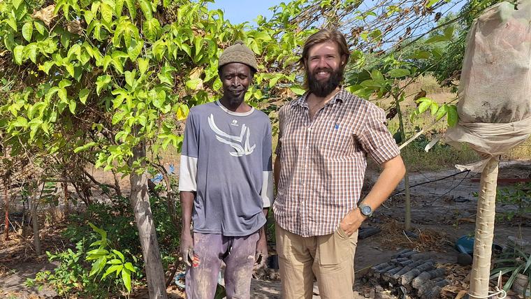 Spencer and his counterpart collaborate on environmental projects in Senegal.