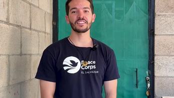 Volunteer Evan in Fron of His Home in El Salvador