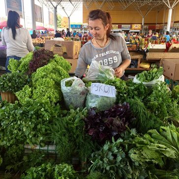 A salad vendor at the local bazaar.