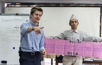 Peace Corps Volunteer Tommy taking English class