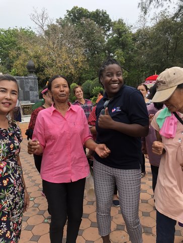 Zari with members of her community at a monk ordination.