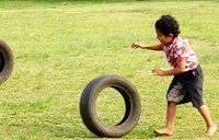 Tongan boys with low-tech toys