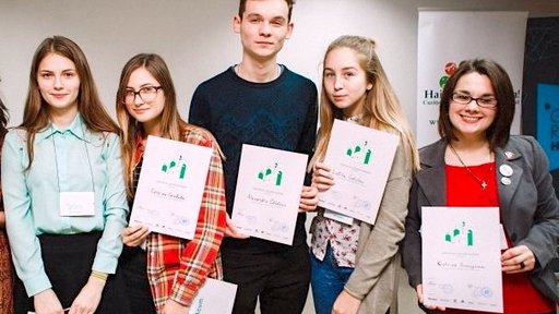 Youth leaders display certificates after participating in the 2016 “Ecohackathon"