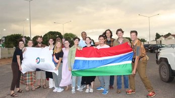 Trainees in The Gambia pose for a photo after arriving in country.