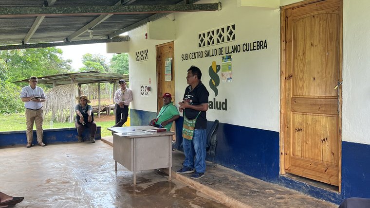 Community members voice their needs at a meeting with health officials in Panama.