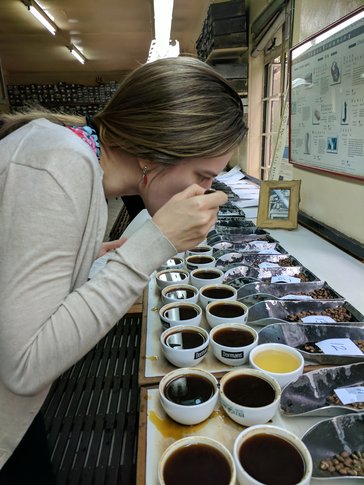 Kait tasting coffee in Kenya