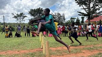 Kid in Uganda Jumping a Hurdle in the Middle of a Race