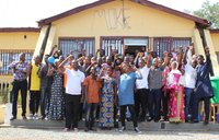 Large group of people in front of building
