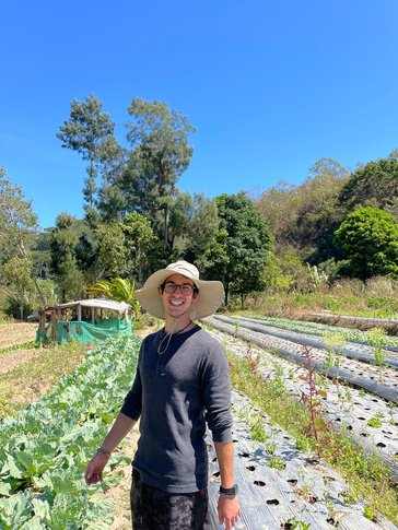 Sina helps out on a local farm in Timor Leste.
