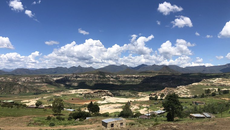 Volunteers must often hike across Lesotho’s mountainous terrain to implement projects.