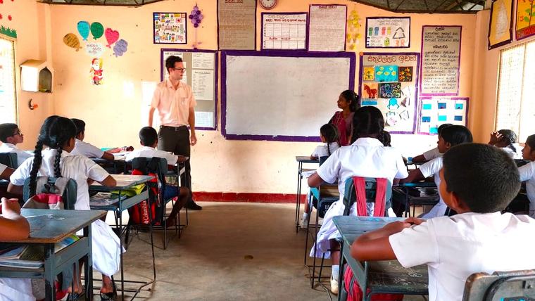 Aidan teaches with his counterpart in Sri Lanka.