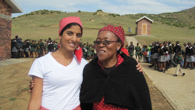 Aparna with her host mother, wearing traditional seshoeshoe clothing.
