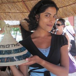 Aparna Jayaraman holding a hat