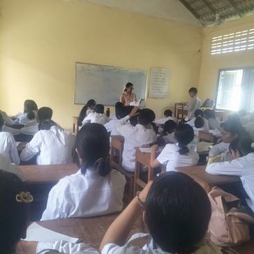 Arthi teaches English to secondary students in Cambodia