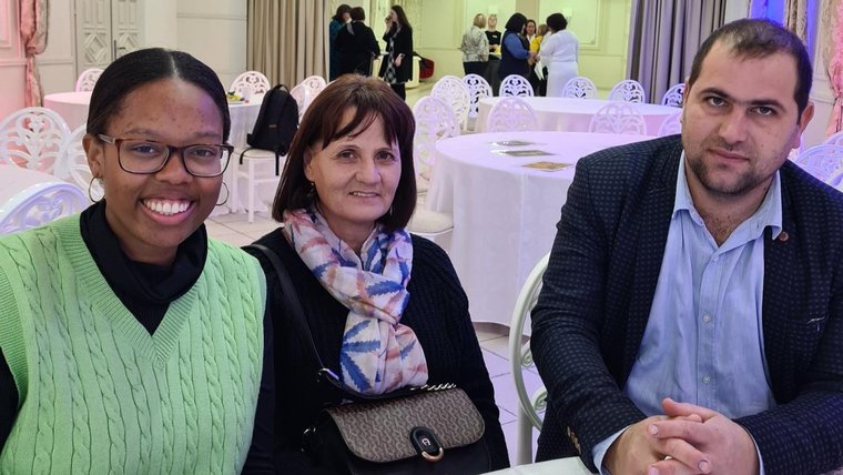 Ashli's first meeting with her counterpart and the mayor of the village in Moldova.