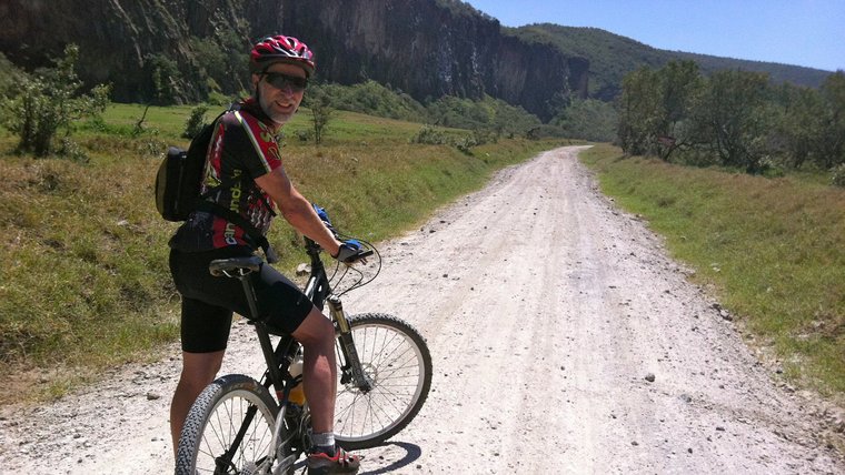 Carl Henn cycling in Kenya