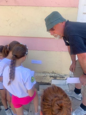 Ben works with youth participating in a math race.